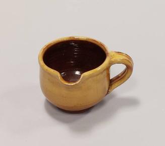 Earthenware Handled Pourer with Yellow and Brown Glazes