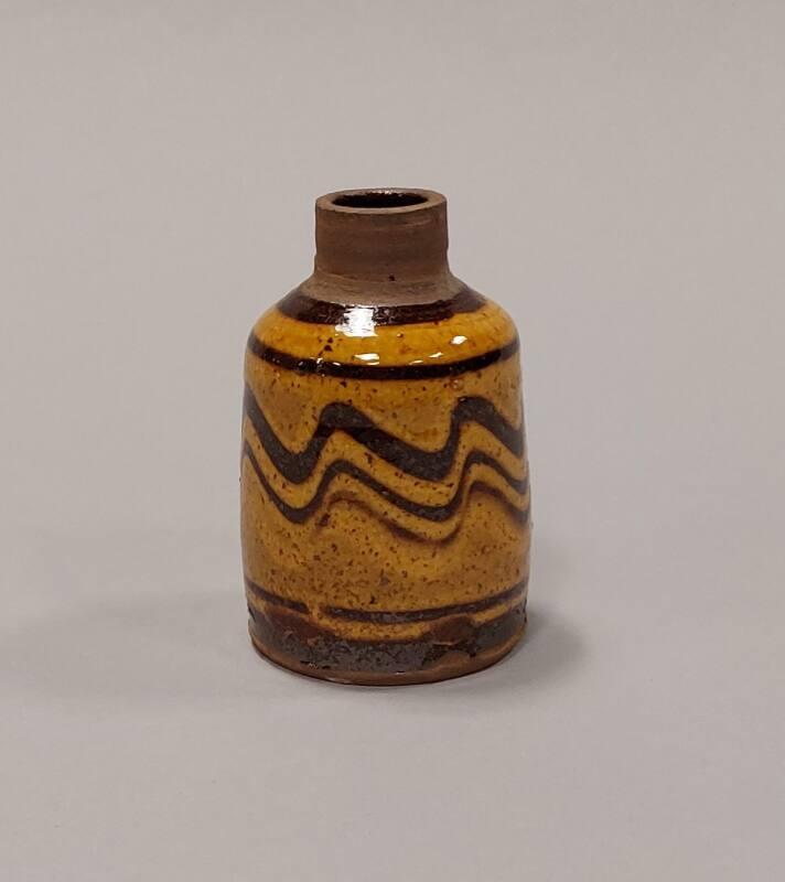 Earthenware Small Bottle with Yellow Speckled Glaze and Wave Pattern