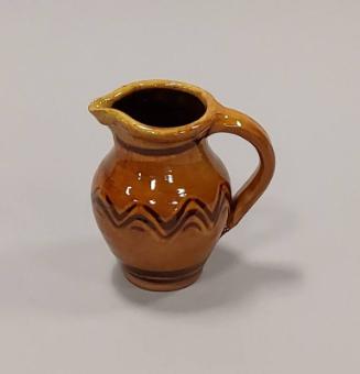 Earthenware Small Jug with Yellow Ochre and Dark Brown Glazes