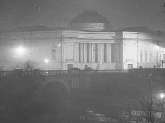 Floodlit Cowdray Hall and War Memorial Lion