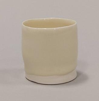 Small Oval White Porcelain Pot With Pale Yellow Glaze