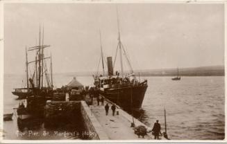 view of bow and starboard side of 'st nicholas' at the pier, st margaret's hope, orkney