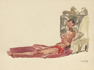 Male figure on pink cushions