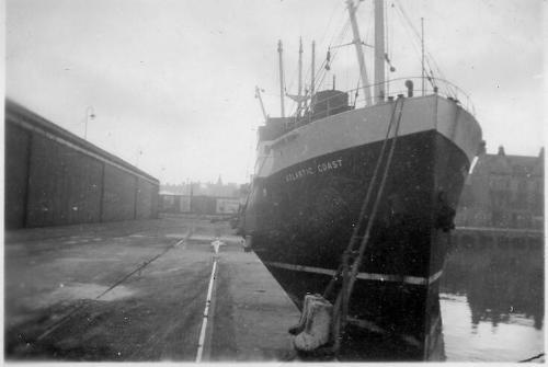 Black and White Photograph in album of 'Atlantic Coast' alongside at Aberdeen Harbour