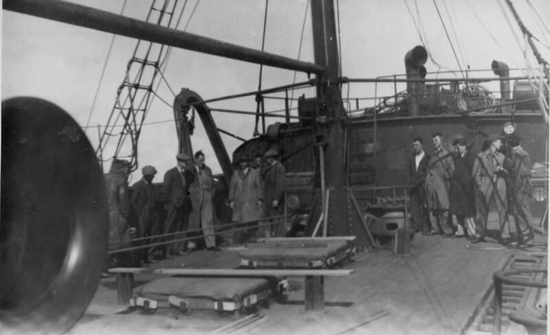 Black and White Photograph in album showing passengers and crew on deck of 'St Clement' (II)