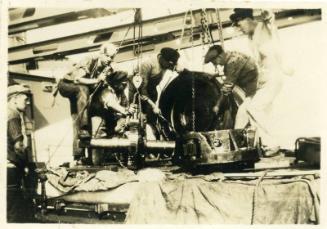 Photograph of engineers at work