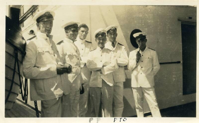 Photograph of group of officers aboard unknown vessel (mr jackson, david law, mr moncrieff, mr wilkie, 8th engineer and mr smithson)