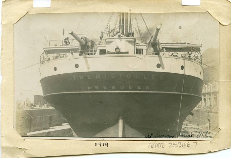 Photograph of THEMISTOCLES at Simons Town, South Africa, with guns, 1919