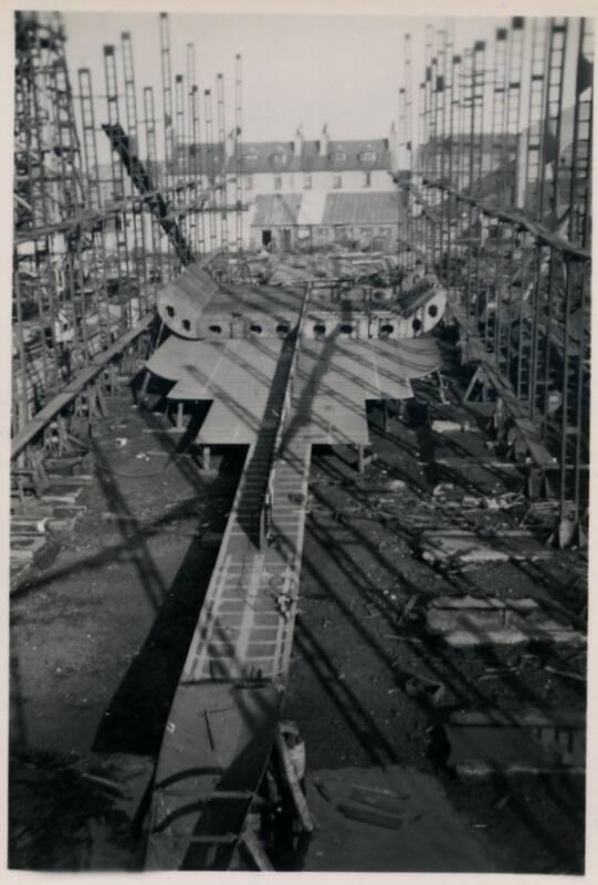 black and white photograph of steam collier Ajasa under construction