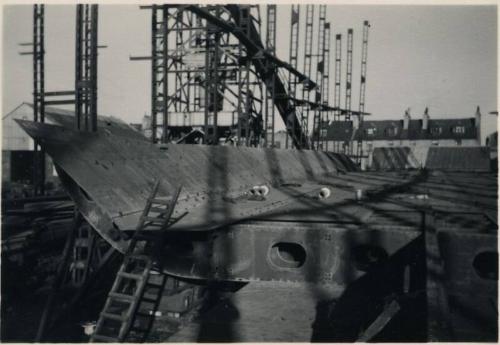 black and white photograph of steam collier Ajasa under construction