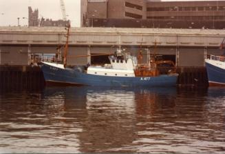 Colour Photograph Showing Port Side Of Aberdeen Trawler A477 At Aberdeen Fish Market