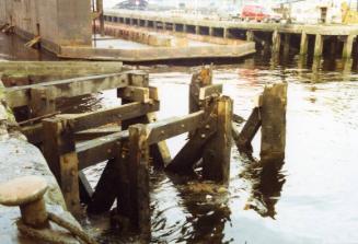 Colour Photograph Showing Damage To The Quaysidee At Point Law