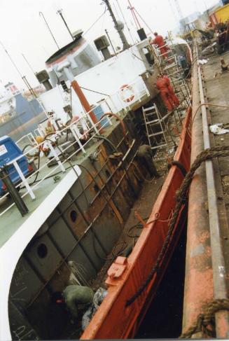 Colour Photograph Showing The Standby Vessel Grampian Explorer undergoing Maintenance Work