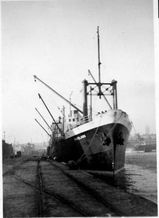 Black and White Photograph in album of cargo vessel 'Pineland' in Aberdeen Harbour