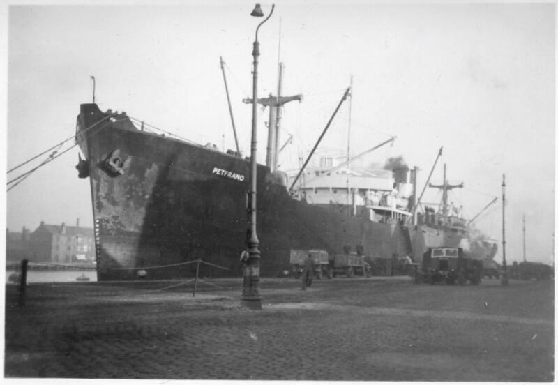 Black and White Photograph in album of cargo vessel 'Petfrano' in Aberdeen harbour