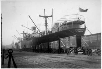 Black and White Photograph in album of cargo vessel 'Petfrano' in Aberdeen harbour