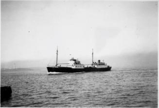 Black and White Photograph in album of Dutch cargo ship 'Matar N' under way