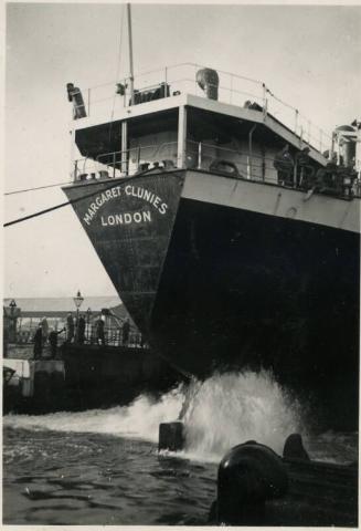 Black and White Photograph in album of stern of vessel 'Margaret Clunies' docking