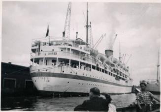 Black and White Photograph in album of passenger/troopship ship 'Dilwara' docked