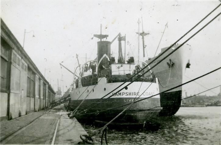 Black and White Photograph in album of ship 'Hampshire Coast' and 'Aberdonian Coast ' at dockside