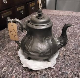 Metal Teapot With Floral Decoration