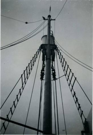 Black and White Photograph in album onboard ship close up of mast