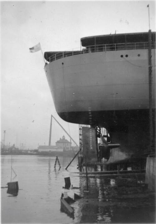 Black and White Photograph in album stern of 'Vikdal' in Hall Russell's shipyard