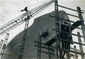 Black and White Photograph in album - bow of 'Vikdal' in Hall Russell's shipyard