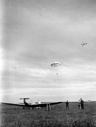 View Of Aircraft and Parachutist