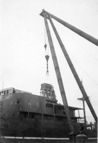 Black and White Photograph in album of cargo vessel 'Hero'