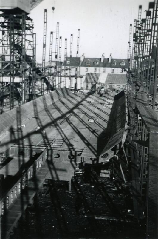 black and white photograph of steam collier Ajasa under construction