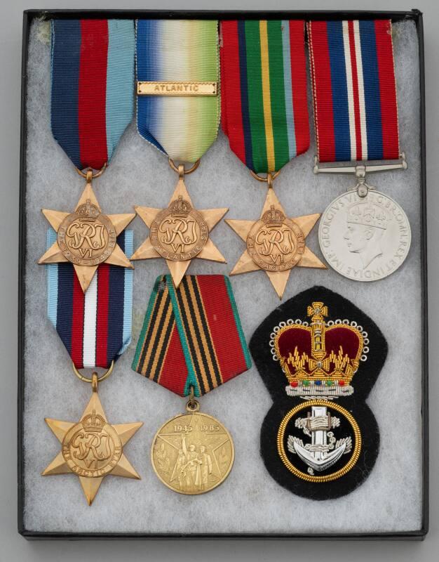 Six medals and cap badge in box