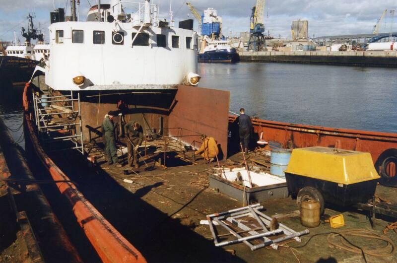 Colour Photograph Showing Men Doing Repair Work On The Deck Of An Unknown Vessel, Possibly 'grampian ..