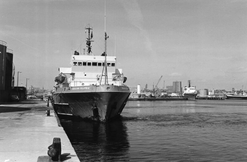 Black/White Photograph Showing The OSV SEALION COLUMBIA  In Harbour, Looking Along The Bow