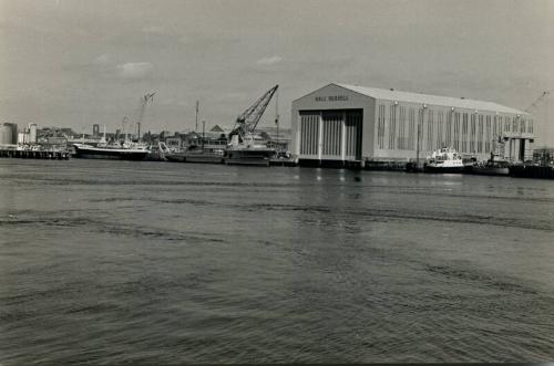 Black/White Photograph Showing The Hall Russell Shipyard From Across The Harbour