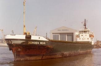 Colour Photograph Showing  Icebreaker & Anchor Handling Supply Tug IKALUK in Harbour, Bow On View