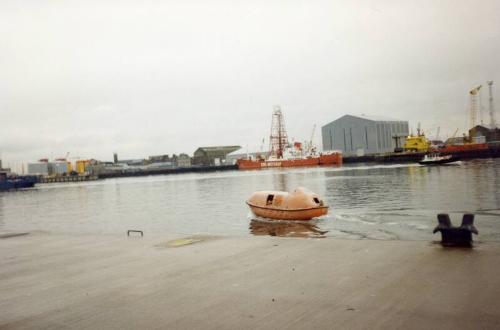 Colour Photograph Showing Drillship COE METCALF In Aberdeen Harbour,  RGIT TEMPSC craft  In Foreground