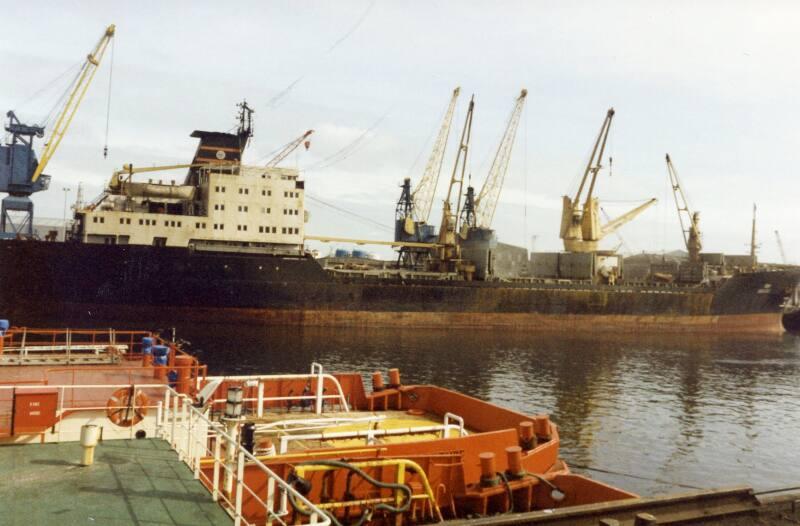 Colour Photograph Showing The Cargo Vessel 'ravidas' In Aberdeen Harbour, From Bombay