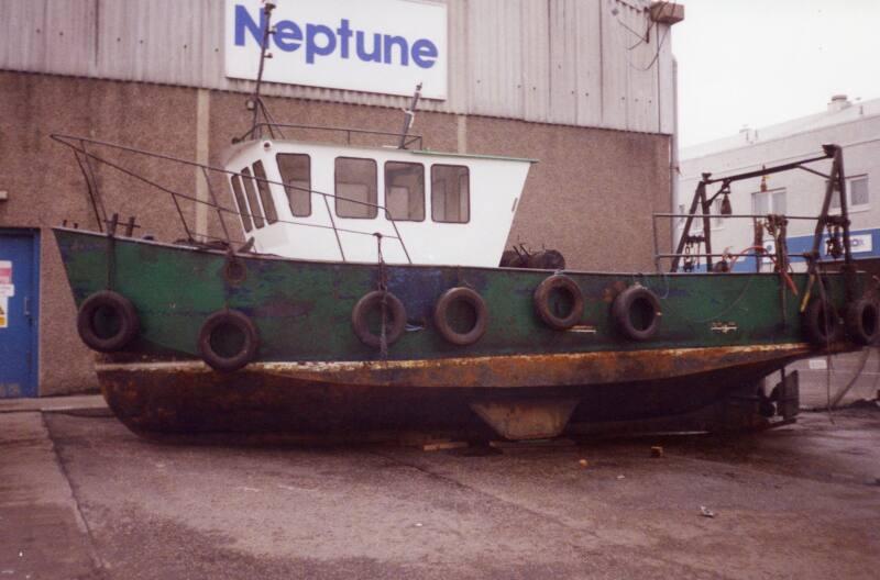 Colour Photograph Showing A Small Fishing Vessel Outside The Neptune Fish Processing Work, Albert Dock