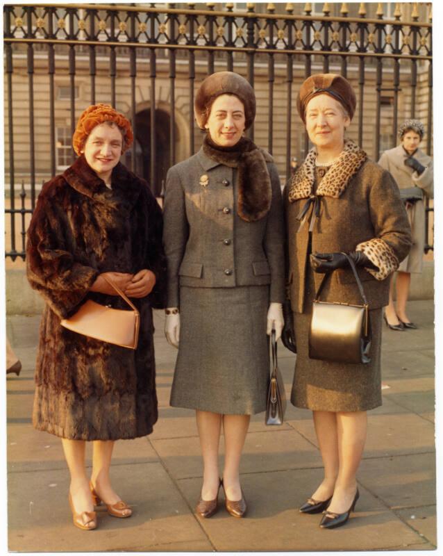 Miss Isabella Fimister at M.B.E. Investiture with Two Others