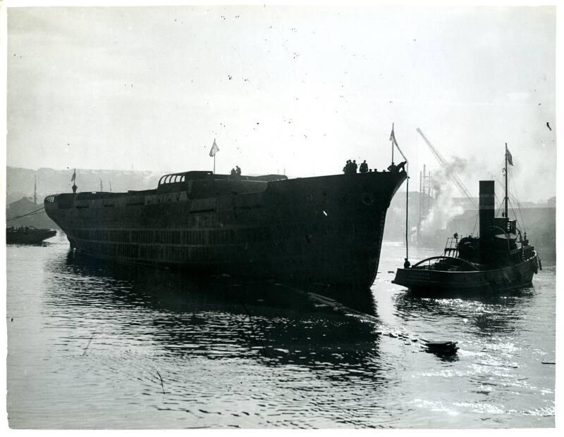 Black and white photograph showing 'fulham x' in harbour after launch