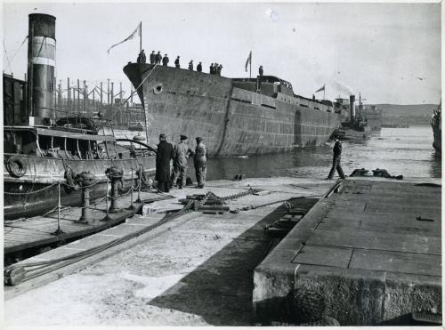 Black and white photograph showing 'fulham x' in harbour after launch