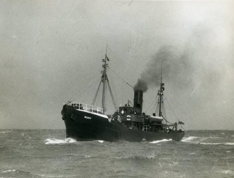 Black and white photograph showing view of port bow of 'bluff' at sea