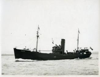 Black and white photograph showing view of port side of  Anemone at sea