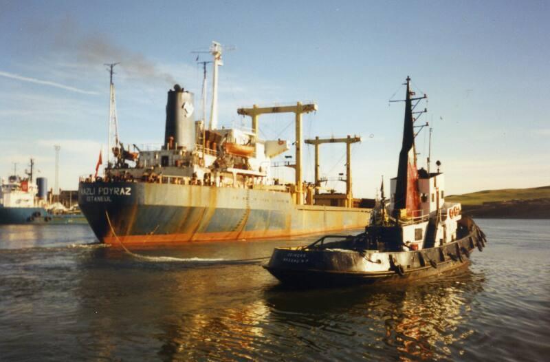 Colour Photograph Showing The Cargo Vessel 'nazli Poyraz' Undertow By Tug 'schelde 32' In Aberdeen