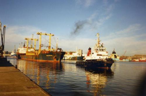 Colour Photograph Showing The Cargo Vessel 'nazli Poyraz' Undertow By Tug 'schelde 32' In Aberdeen