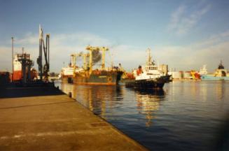 Colour Photograph Showing The Cargo Vessel 'Nazli Poyraz' under Tow by Tug 'Schelde 32' in Aberdeen