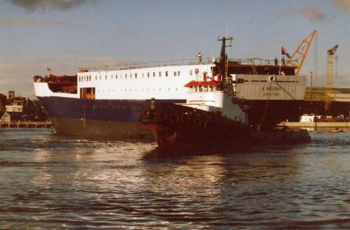 Colour Photograph Showing The Launch Of The Vessel 'st Helena' At Hall Russell, Tug In Foreground