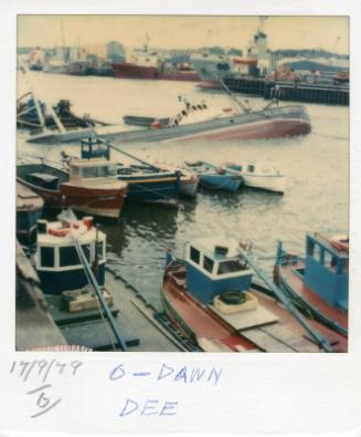 Colour Photograph Showing Fishing Vessel 'ocean Dawn' On Its Starboard Side In The River Dee