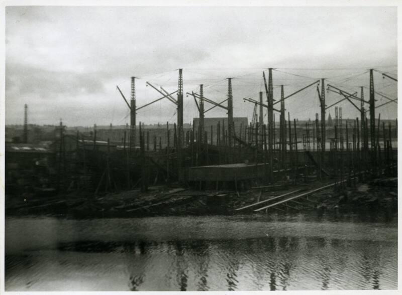 Photograph showing the Lewis shipyard from the River Dee